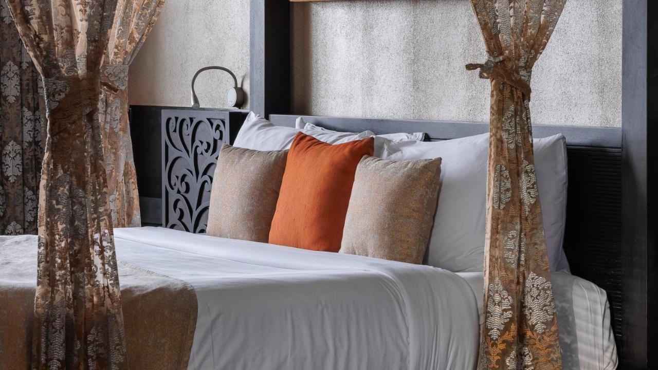 The Panoramic Getaway Hotell Munnar Eksteriør bilde A bed with cushions