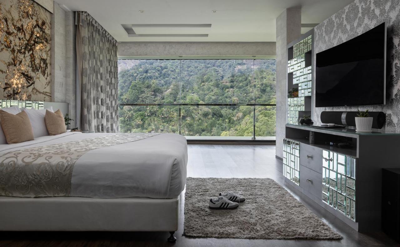 The Panoramic Getaway Hotell Munnar Eksteriør bilde A bedroom at the hotel