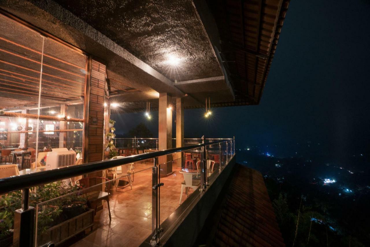 The Panoramic Getaway Hotell Munnar Eksteriør bilde The restaurant at the top of the tower